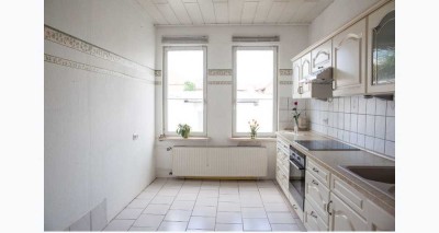 Historisches Stadthaus mit Gewerbefläche, Ausbaupotenzial und gepflegtem Hinterhof