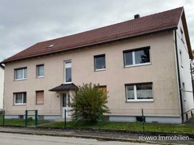 Gepflegte 3-Zimmer-Erdgeschosswohnung mit Loggia, Garage und großem Kellerraum in Garching an der Al