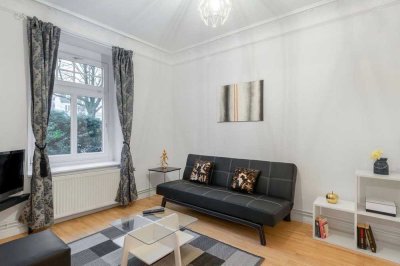 Moderne und zentrale Altbauwohnung in Eppendorf (möbliert, befristet)