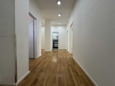 ansprechende 4-Zimmer-Wohnung mit Einbauküche, 2 Bädern und Mietergarten