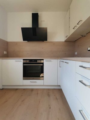 Helle 3-Zimmer Erdgeschosswohnung mit EBK in zentraler, ruhiger Lage von Ebern mit toller Aussicht