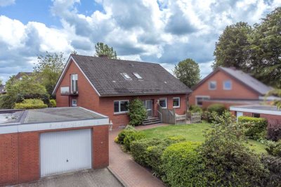 Ruhig gelegenes Zweifamilienhaus mit schön eingewachsenem Grundstück in Fockbek - voll vermietet