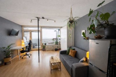 Urbaner Weitblick im 8. Obergeschoss – Licht, Raum und Lebensqualität über den Dächern von München