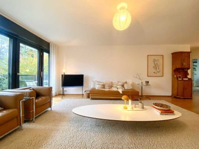 Exklusives Wohnen im Park: Lichtdurchflutete 3,5-Zimmer-Wohnung mit zwei Balkonen, Pool & Sauna