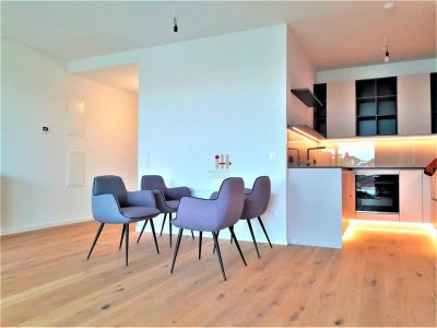 Neues Zuhause im Grünen: Moderne 2-Zimmer-Wohnung mit Loggia und Fußbodenheizung