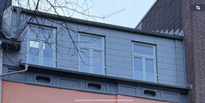 Top saniere DG Wohnung mit großer Terrasse über den Dächern von MG City