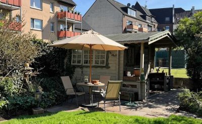Stadtwohnung mit Garten, Garage und Wellnessbereich