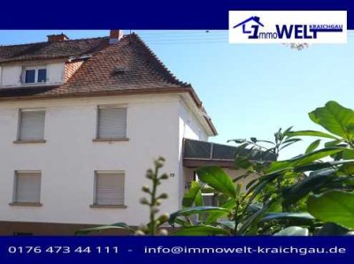 Charmante Doppelhaushälfte mit üppigem Garten und Garage