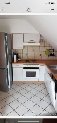 Schöne und gepflegte 4-Raum-Dachgeschosswohnung mit Balkon und Einbauküche in Rethen
