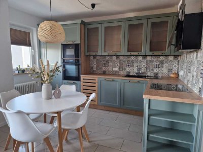 Modern & bezugsbereit: 3-Zimmer-Wohnung mit hochwertiger Einbauküche, Balkon & Garagee