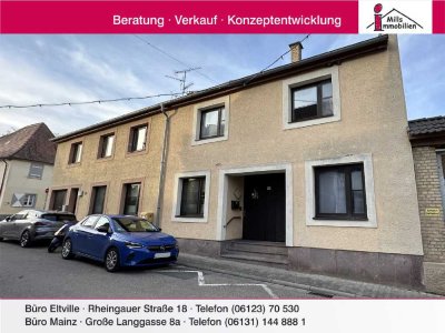 Harxheim  2 Häuser zum Preis von einem 
Top 4 Parteienhaus in ansprechender Wohnlage