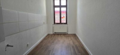 Frisch renovierte Eigentumswohnung mit Balkon zu verkaufen