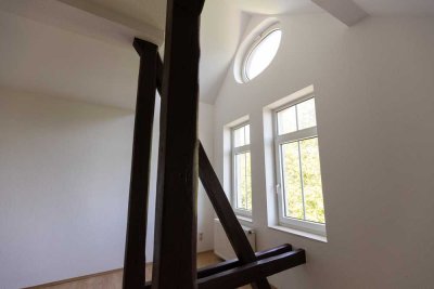 Großzügige 2-Zimmer Dachgeschosswohnung mit Wintergarten