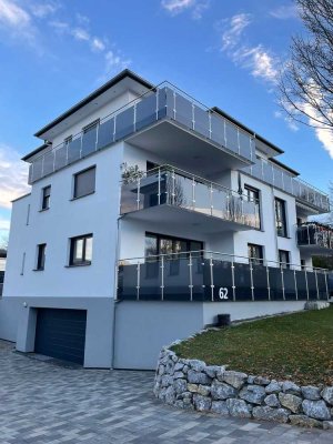 Große, lichtdurchflutete 3-Zimmer-Wohnung mit Terrasse & Tiefgarage – Neubau, barrierefrei