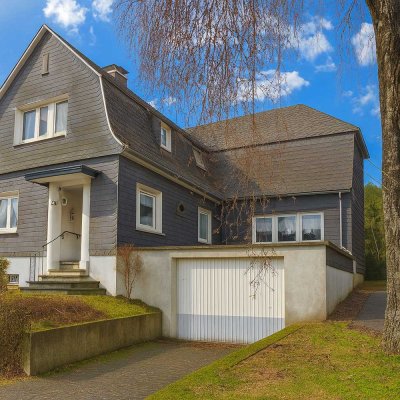 Freistehendes Einfamilienhaus mit großer Garage und Erweiterungspotential