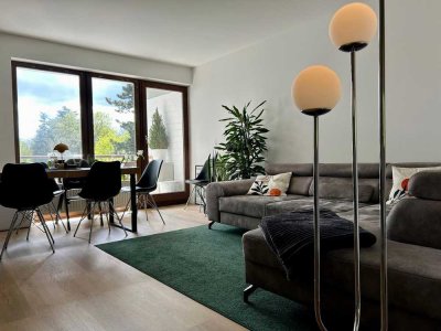 Modernisierte 3-Zimmer-Wohnung mit 2 Balkonen, EBK und Tiefgaragenstellplatz nahe Schloss Kalkum