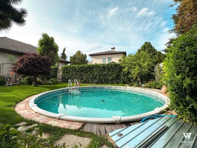 Traumhafte Doppelhaushälfte in Aspern: Voll unterkellert | Pool &amp; Wintergarten | Renoviert