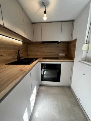 Kernsanierte 1-Zimmer-Wohnung in begehrter Lohrberglage