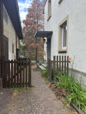 Erdgeschosswohnung mit Garten & Garage und Kaminanschluss