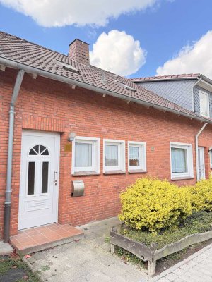 Reihenmittelhaus mit schönem Eigentumsgrundstück und  Garage