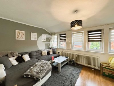 Gepflegte 3-Zimmer-Dachgeschosswohnung mit Altbauflair und Garage in Bahnhofsnähe