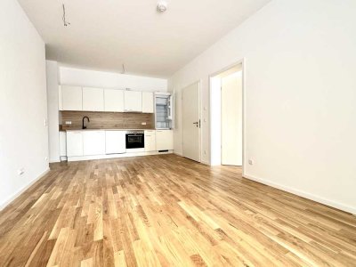 2-Zimmer-Wohnung im Erstbezug mit EBK, Duschbad und Terrasse