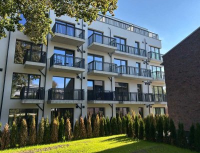 Neubau Erstbezug: helle 1,5- Zimmer Wohnung mit Balkon und Küche