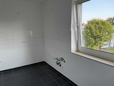 Moderne 2-Zi.-Wohnung mit Wannenbad und Balkon!