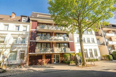 VIELE PLUSPUNKTE: Solides Haus, schöne Wohnung, sonniger Balkon, Gartennutzung, TG-Stellplatz!
