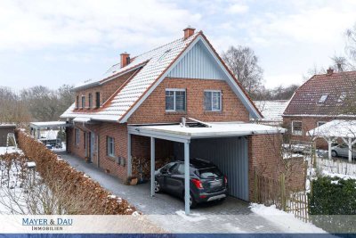 Stilvolle 3-Zimmer-Erdgeschosswohnung mit Garten und Carport in moderner Ausstattung, Obj. 9385
