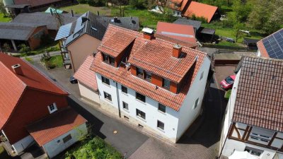 Reduziert Großzügiges Zweifamilienhaus mit seperatem Gartengrundstück in Solz
