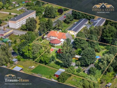 Viel Platz für Ihre Vision – Anwesen mit 367 m² Wohnfläche, sanierten Wohnungen & großem Garten