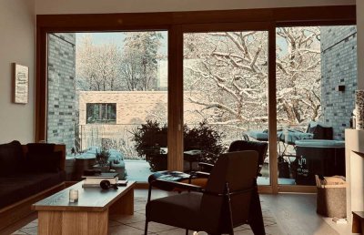 Luxus-Penthouse mit Kamin, Privatpark und Isarzugang in Bestlage von München-Harlaching