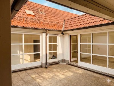 Exklusive Atrium-Wohnung mit außergewöhnlicher Dachterrasse