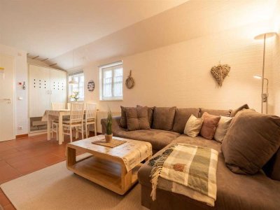 Strandnah & ruhig an der Feldkante – beliebte 2-Zimmer-Wohnung in Top Lage