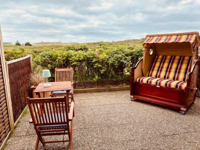 Erdgeschoss-Appartement mit Südterrasse und Fernblick in strandnaher Lage
