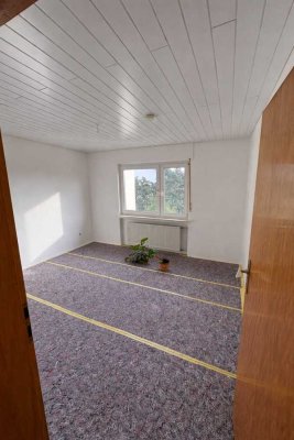 Eine Immobilie mit großem Garten die zum wohlfühlen einlädt