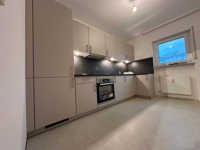 Modernisierte 2-Zimmer-Wohnung mit Einbauküche und Stellplatz