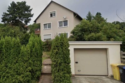 Vermietetes 3-Familienhaus mit Garagen und Garten