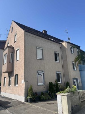 Mehrfamilienhaus mit 5 Wohnungen und Gewerbeeinheit in zentraler Lage