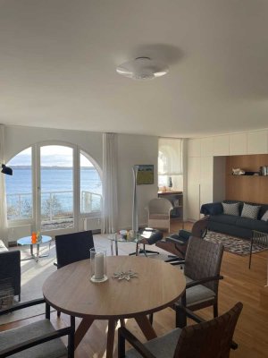 Traumhafter Meerblick: Exklusive 2-Zimmer Maisonette-Wohnung im 2./3. OG mit großer Dachterrasse