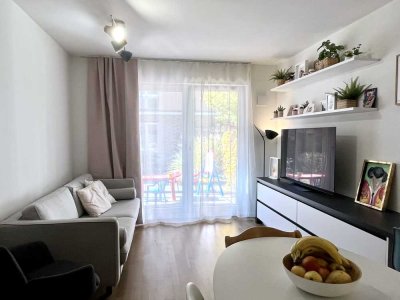 Gemütliche 3-Zimmer Neubau Wohnung mit Einbauküche, Terrasse, TG-Stellplatz und Keller in Allach