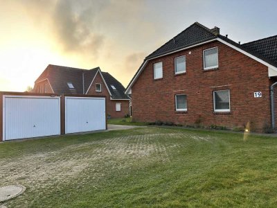 Einmalige Gelegenheit Charmante Erdgeschosswohnung mit Terrasse und großer Garage