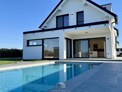 ERSTBEZUG: Exklusives Einfamilienhaus mit Pool, Doppelcarport und zwei Dachterrassen in Kalsdorf bei Graz
