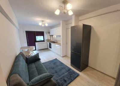 Erstbezug nach Sanierung mit Balkon und Einbauküche: Exklusive 1,5-Zimmer-EG-Wohnung in Lörrach
