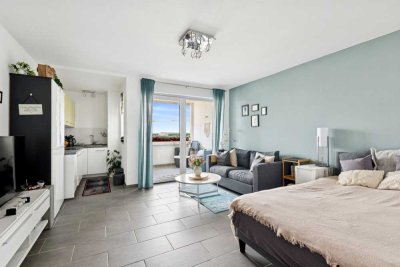 Helle 1-Zimmer-Eigentumswohnung mit Balkon - Wohnen über den Dächern von Langen
