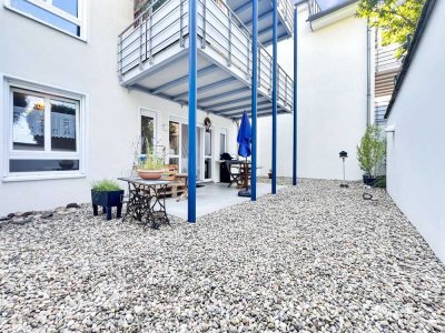 Attraktive 2-Zimmer-Erdgeschosswohnung mit Terrasse und Gartenanteil