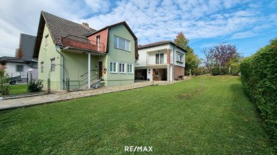 Vielseitiges Mehrfamilienhaus mit Charme und einladendem Garten