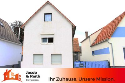 Maisonette-Wohnung in 2-Familienhaus mit Scheune und Garten!