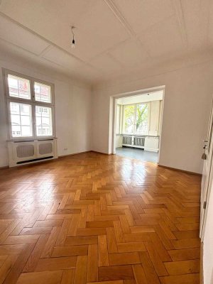 Helle 4-Zimmer-Altbauwohnung mit Wintergarten, Gartennutzung und zusätzlichem Wohnraum im Souterrain